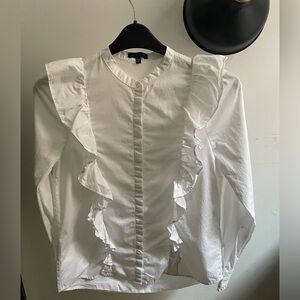 Ruffled white cotton shirt